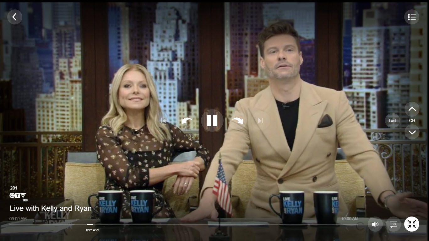 When watching a program, click the minimize icon to open the On Now or On Demand guide.